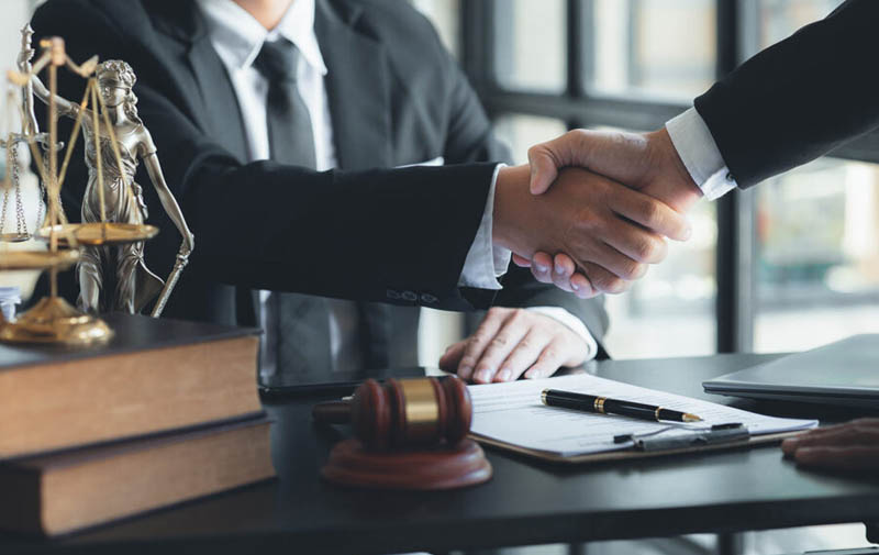 Lawyers doing handshake