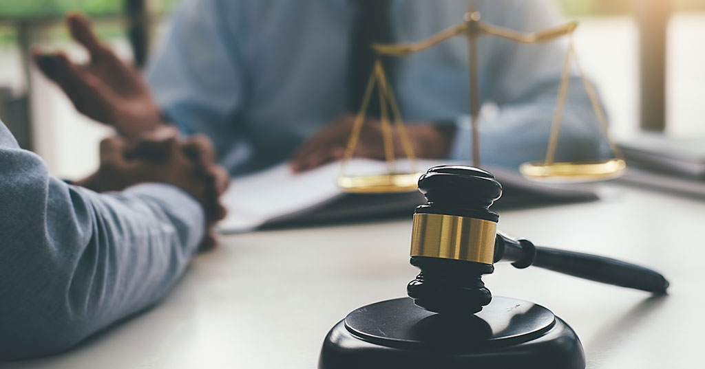 Lawyer providing legal guidance to a client.
